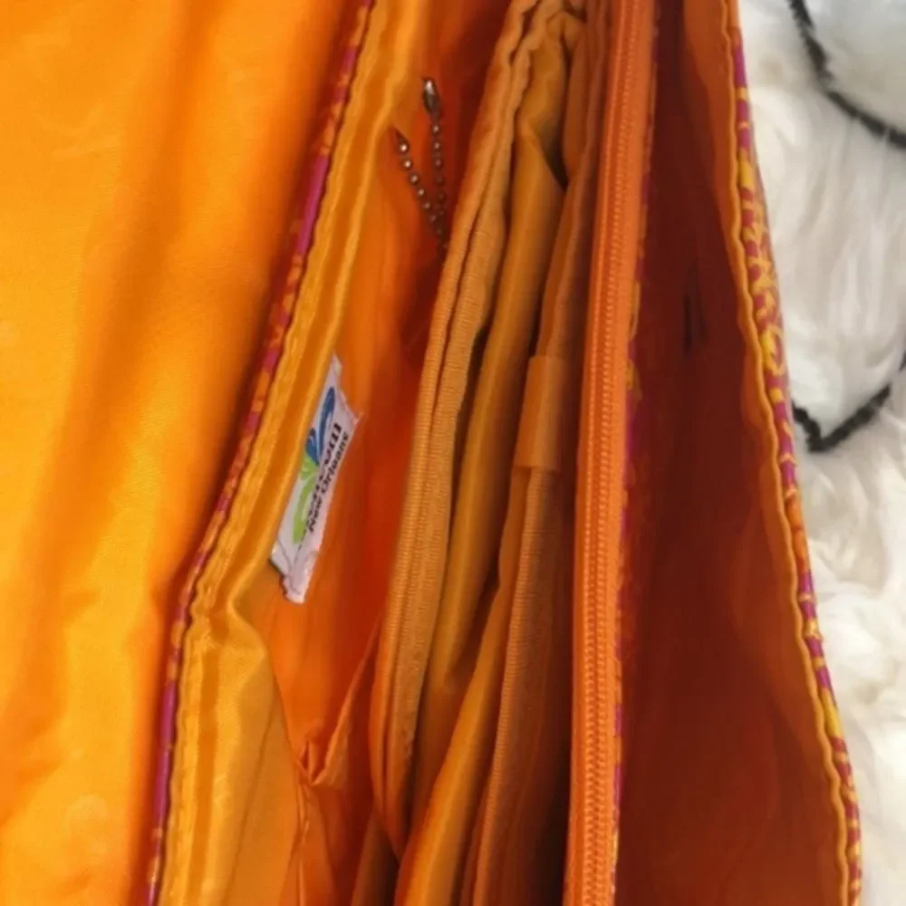 Kelencom Corp. New Orleans diaper orange bag AZO
